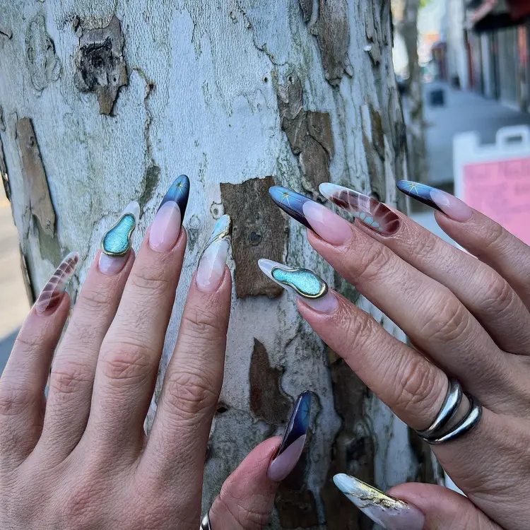 Clear nails with 3D embellishments