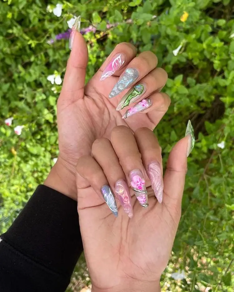 Floral stiletto nail art in natural light