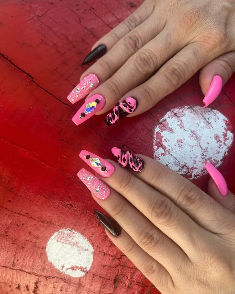 Pink glitter and mixed pattern nail art